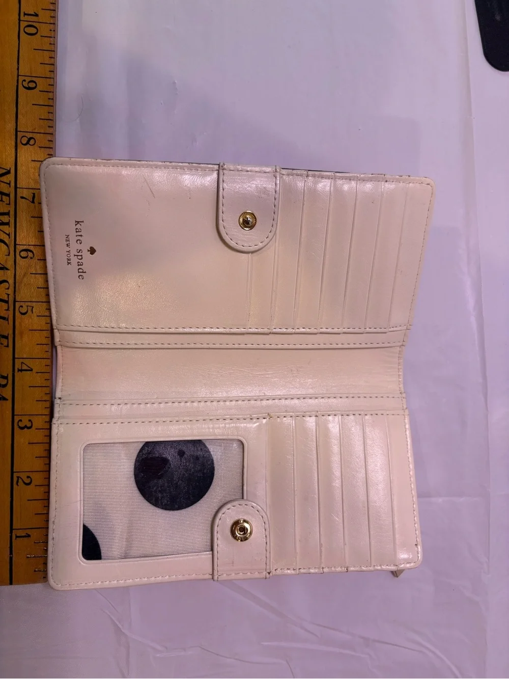 kate spade pink saffiano continental zip-around wallet